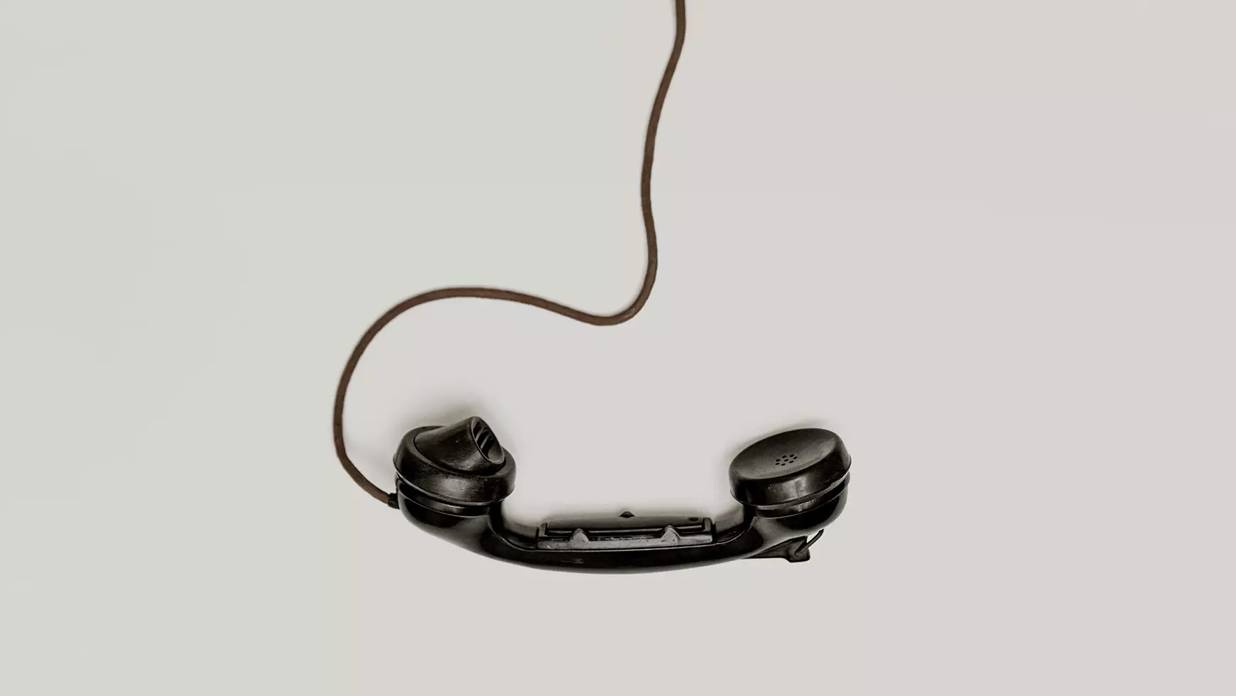 minit-black-corded-telephone-on-the-table